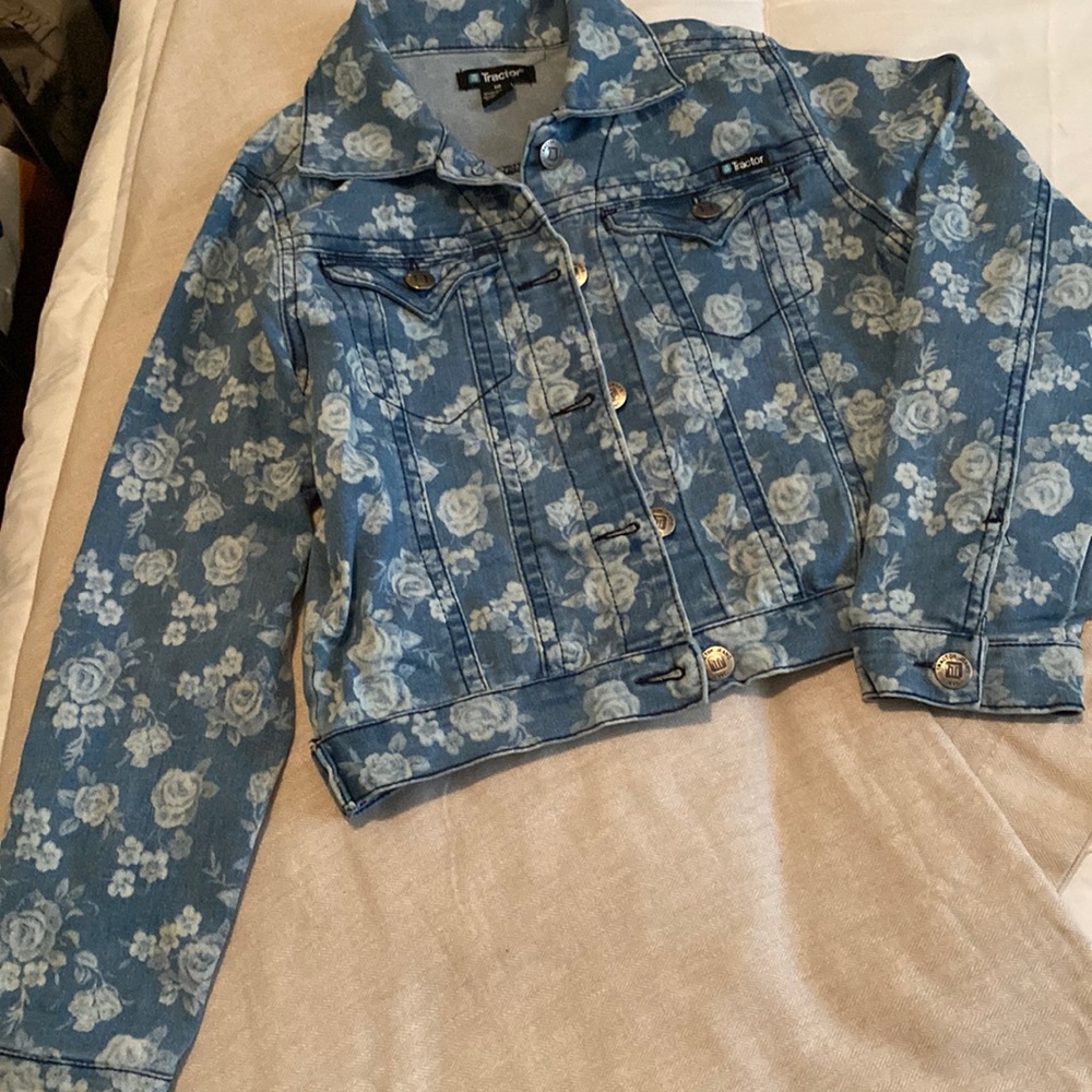 Floral design denim jacket with silver hardware!